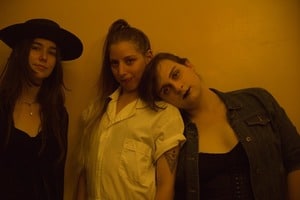 three women blurry photo