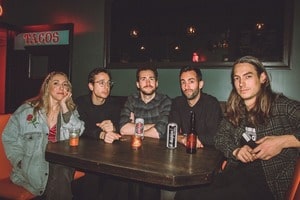 people at a table in a bar