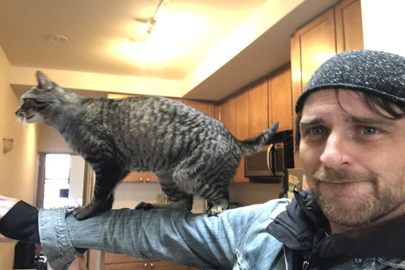 Kevin Rooney and his cat Eric