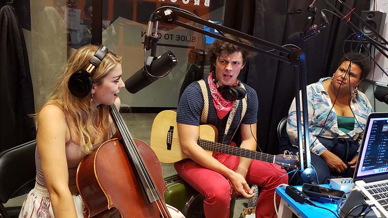 band with cello guitar in radio studio