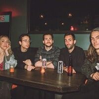 people at a table in a bar