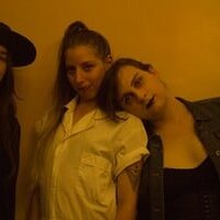 oM8y6u3ZxFolz1W_U07WGA-default three women blurry photo